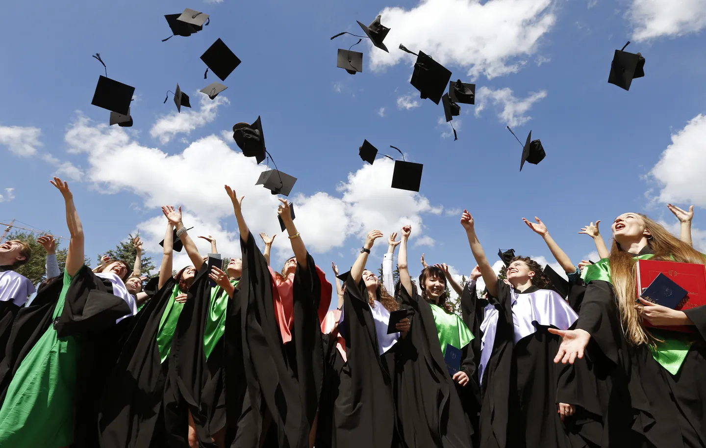 International university graduates celebrating